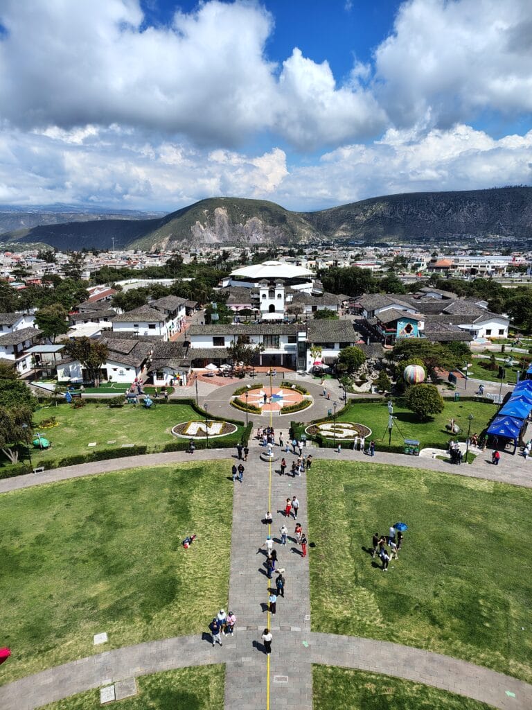 Panoramic view from the observation deck of the Mitad del Mundo Monument overlooking the cultural complex near Quito, Ecuador.