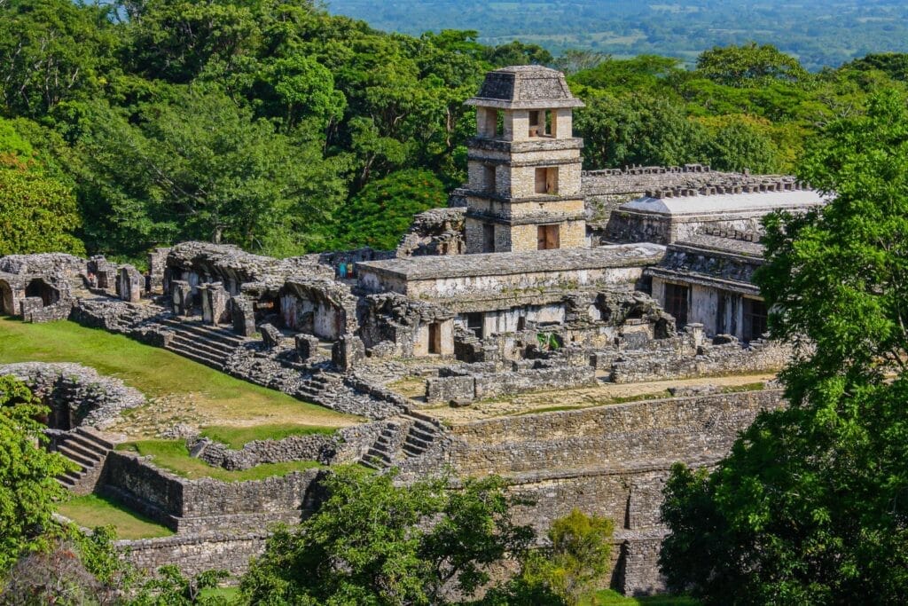 Ancient Mayan ruins surrounded by jungle at Palenque in Chiapas, Mexico.