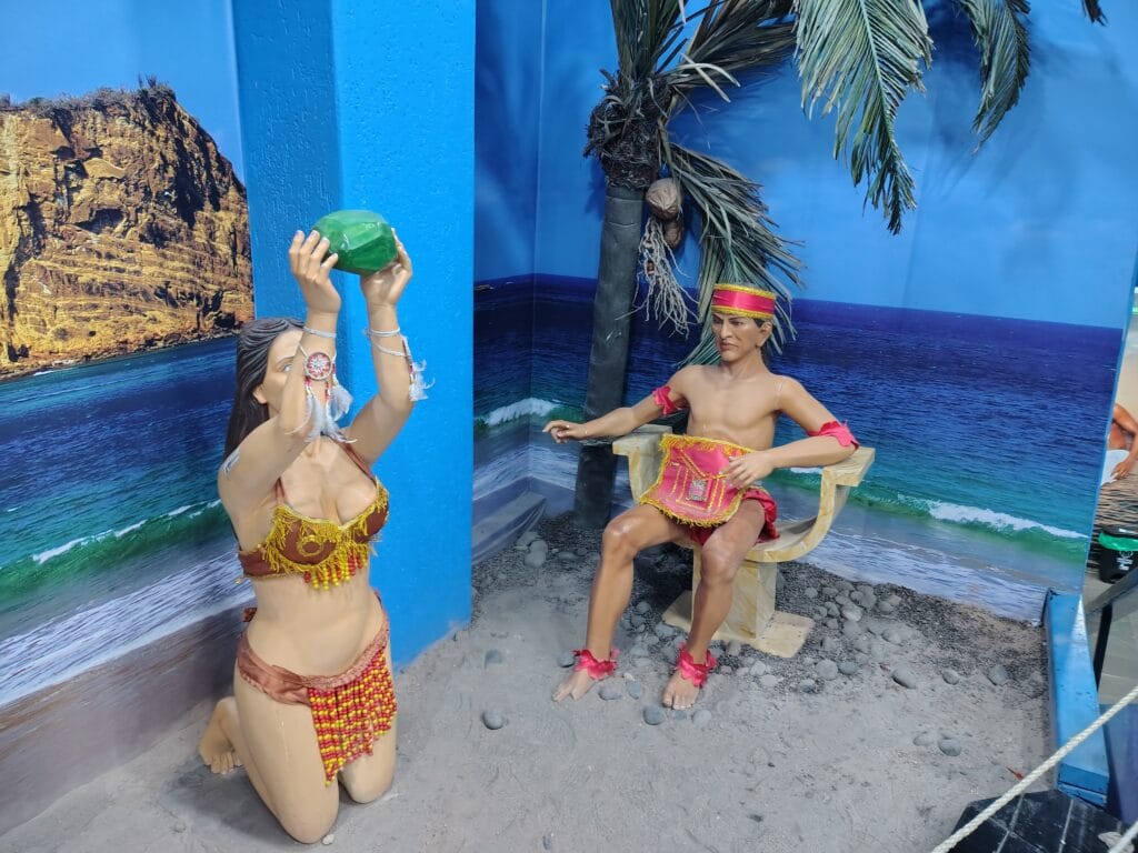 Museum display depicting an ancient ceremonial gathering in pre-Columbian Ecuador.