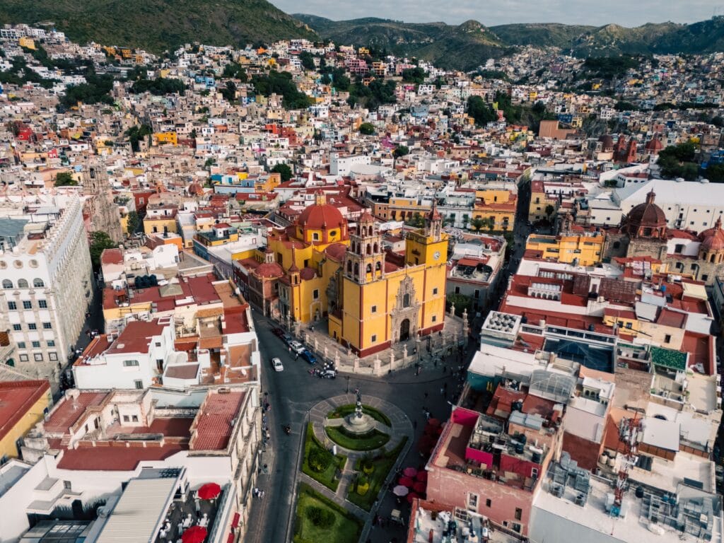 Aerial view of Guanajuato's colorful historic center with the Basilica of Our Lady of Guanajuato in Mexico.