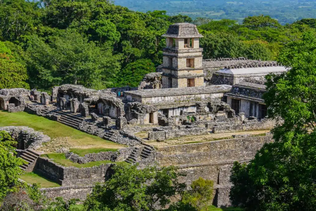 Ancient Mayan ruins surrounded by jungle at Palenque in Chiapas, Mexico.